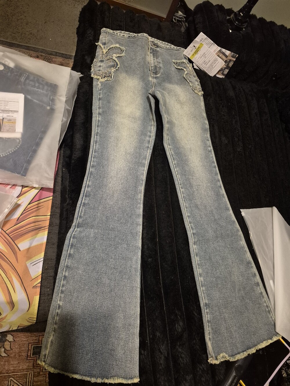 Womens Light Wash Flared Jeans with Distressed Trim